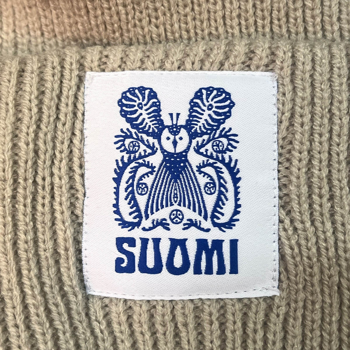 Owl ribbed beanie by Klaus Haapaniemi, Hiekka